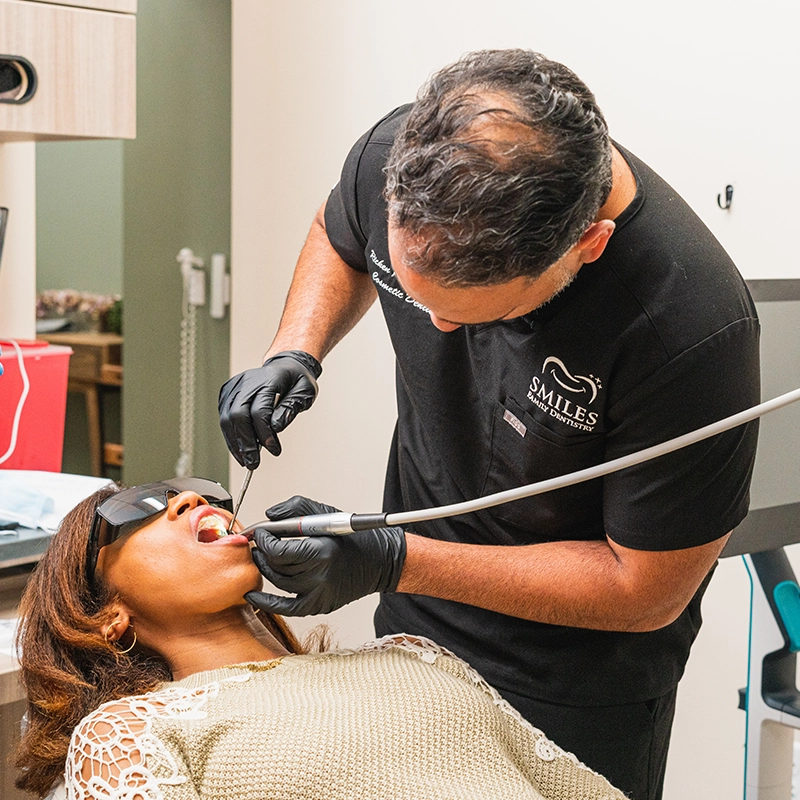 Dentist examining a patient at Smiles Family Dentistry in New Jersey